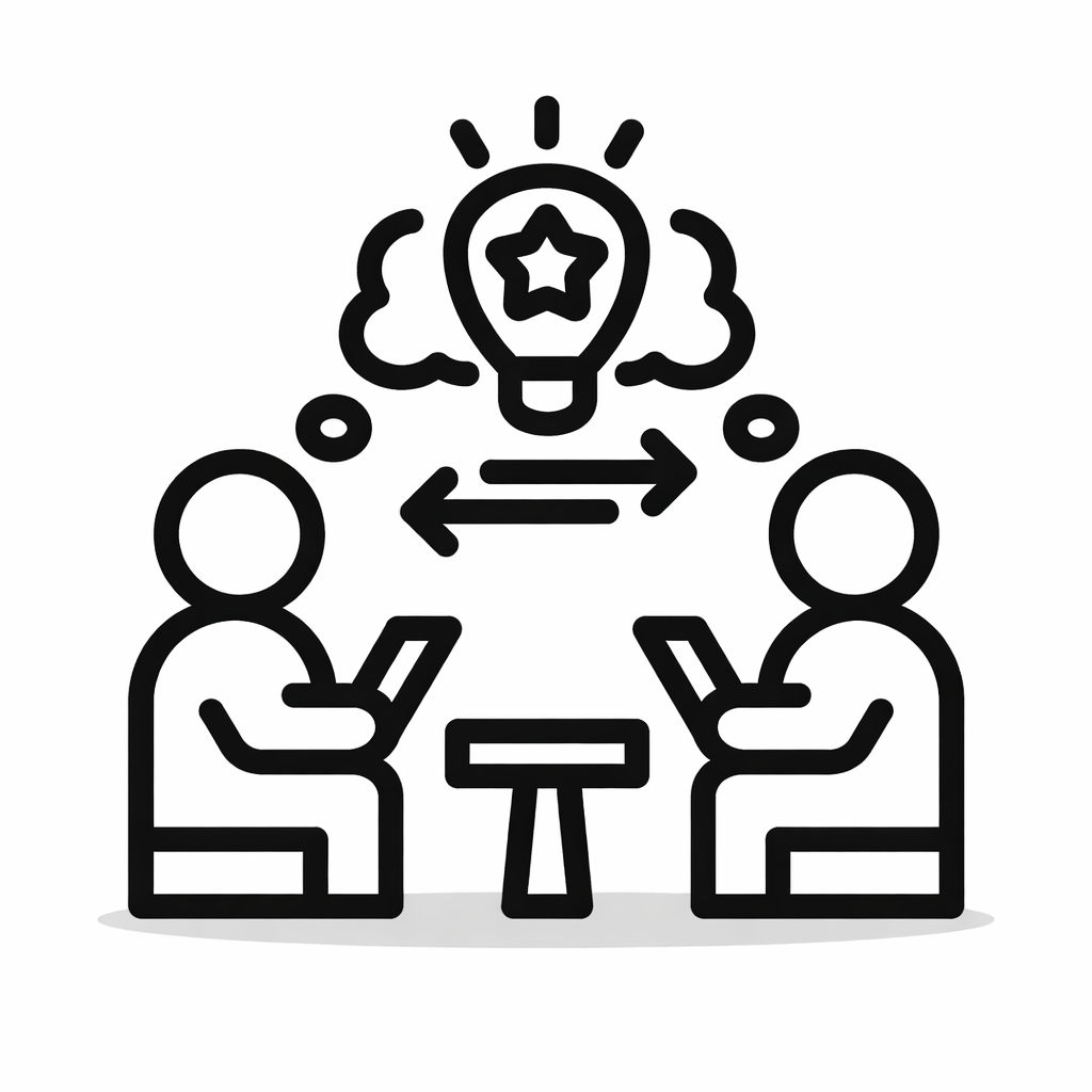 Two people sitting at a table with laptops, sharing ideas symbolised by a light bulb in a thought bubble.